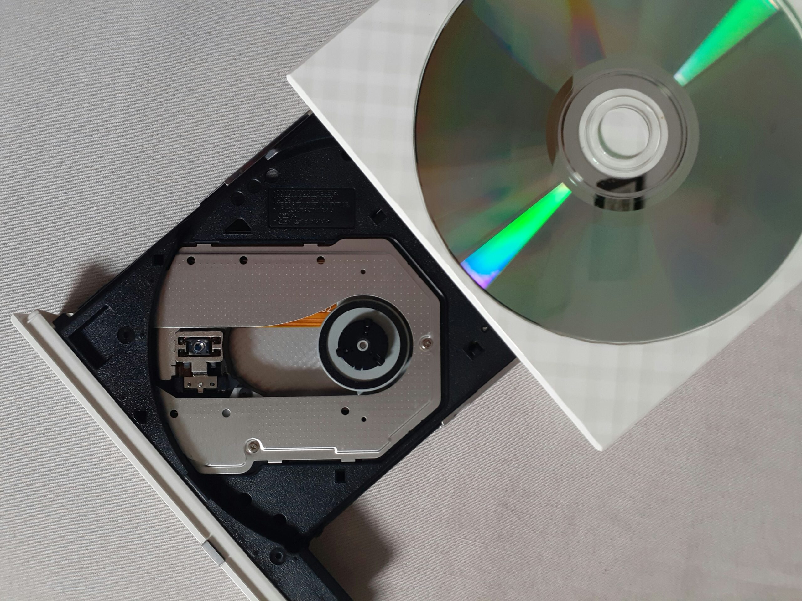 lucky-alamanda-u18Gh2YZaN4-unsplash DVD and CDs ready for digital transfer. We are experts in Wollongong for DVD and CD to digital conversion.