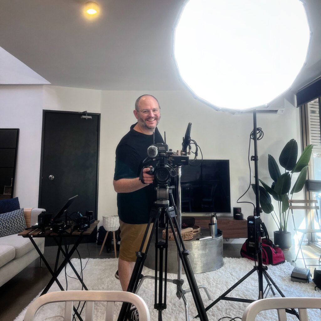 F844751A-5B5B-4974-A295-9E7E27B5F0BE Leading video production company in Wollongong setting up camera and audio gear for a video shoot.